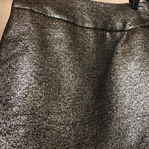 Gold and black mini skirt.